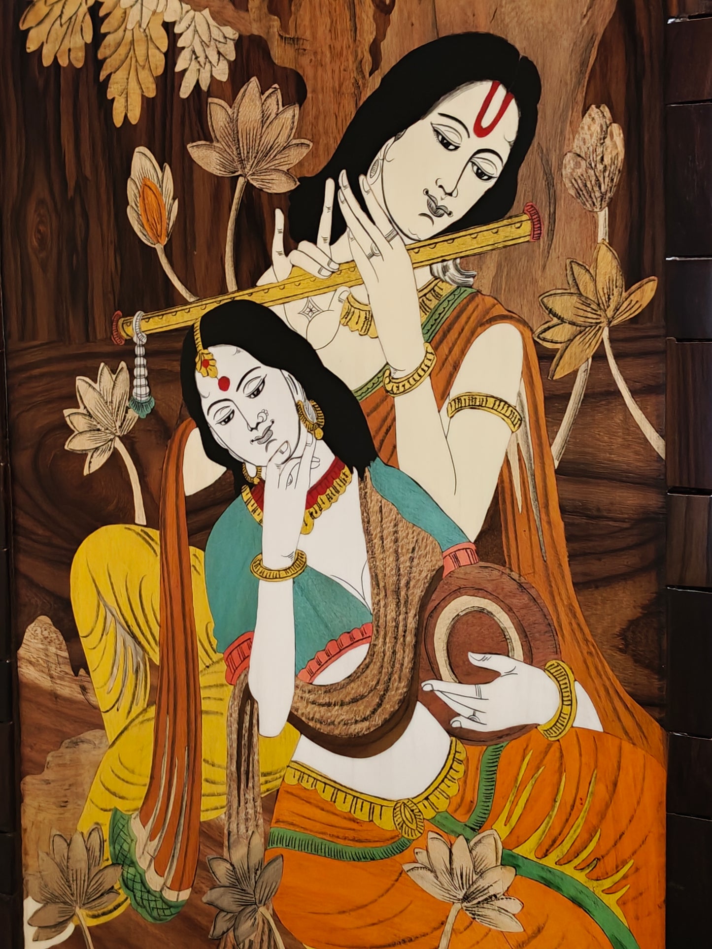 Krishna playing flute alongside Radha - wood inlay work handcrafted wall frame