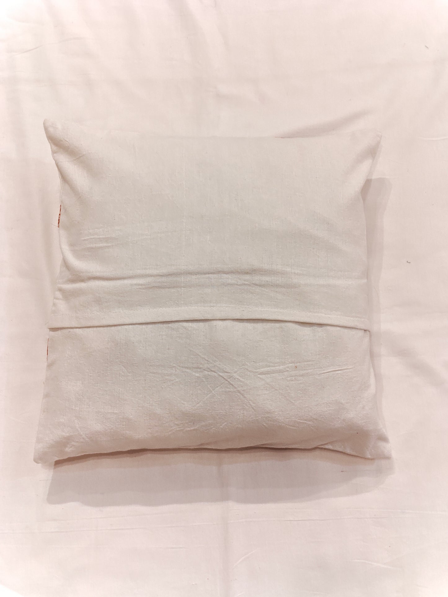 White and red patch work and embroidered cushion cover