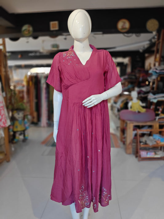 Magenta pleated dress with hand embroidery on shoulder and hem