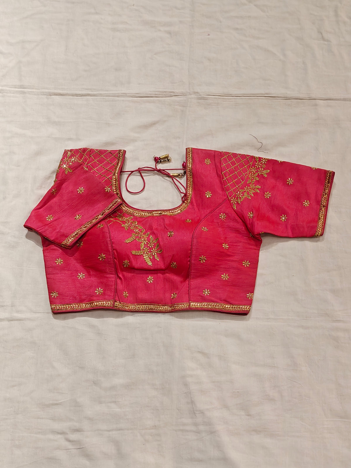 Saree blouse with gold zari embroidery and floral motifs - click to see colors