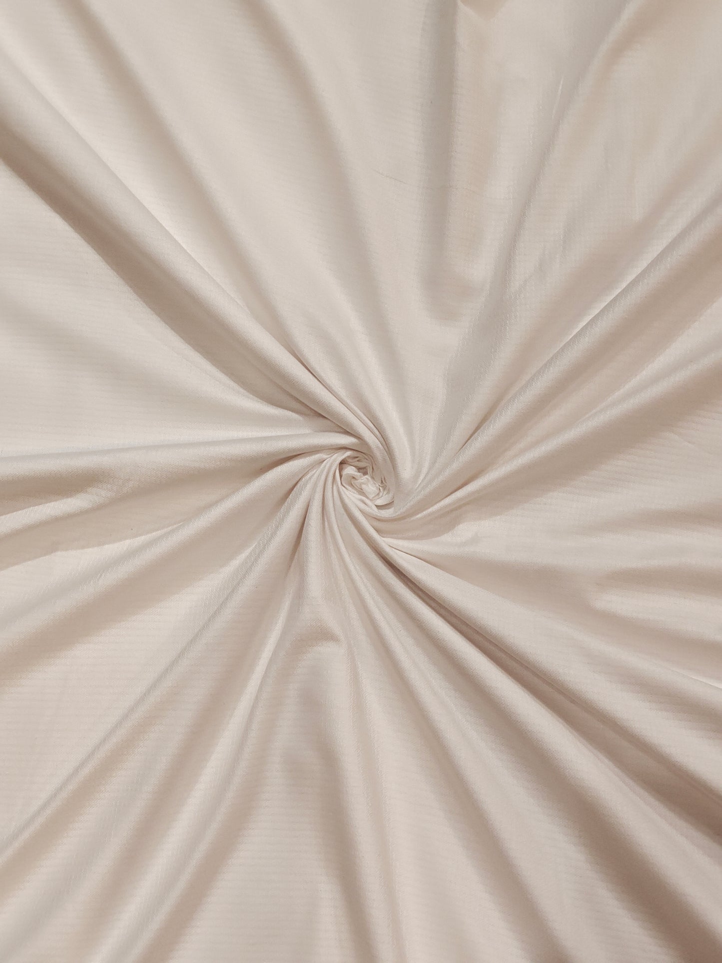 Plain white textured cotton fabric