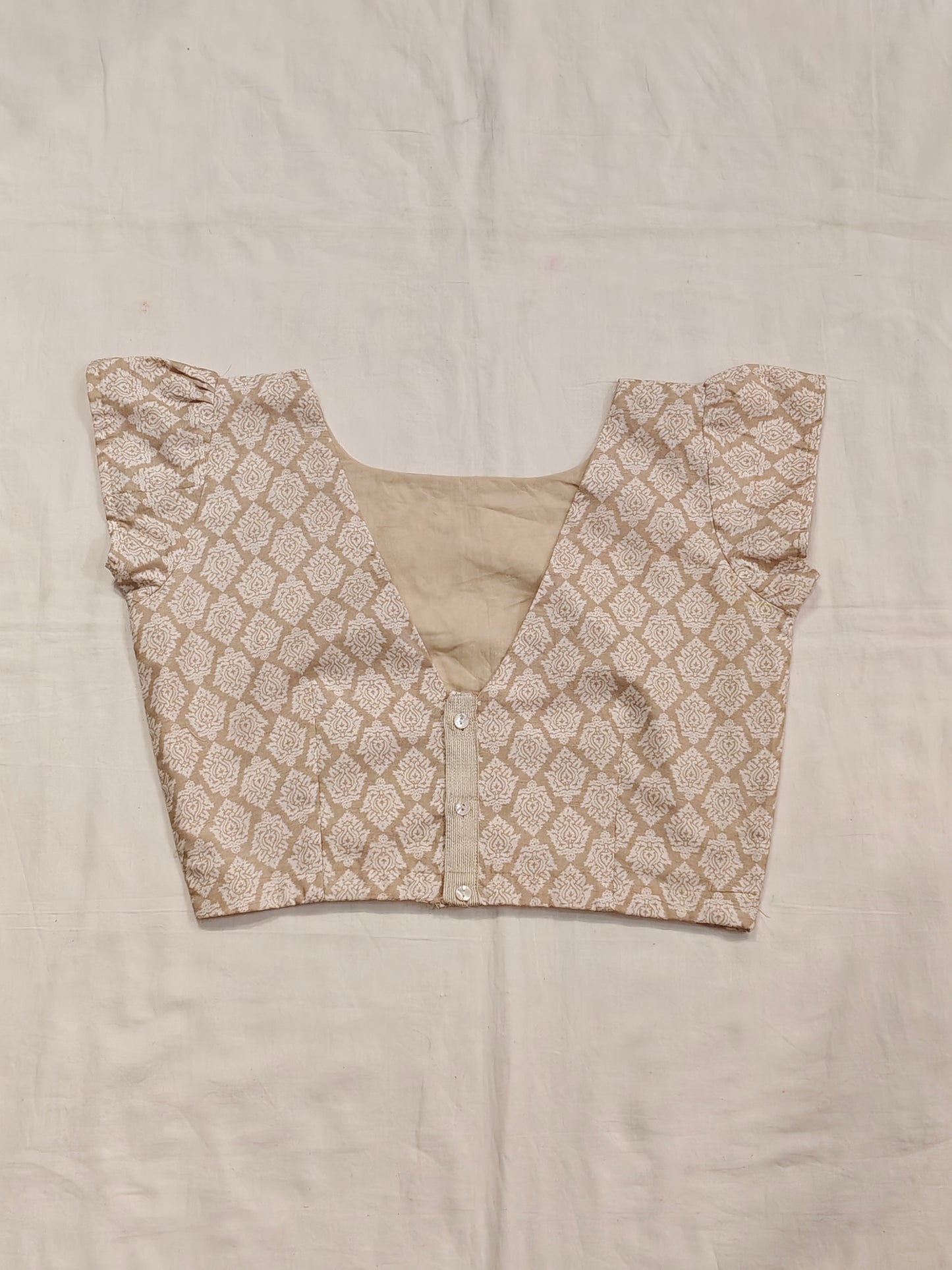 Beige and white prints V-neck silk blouse
