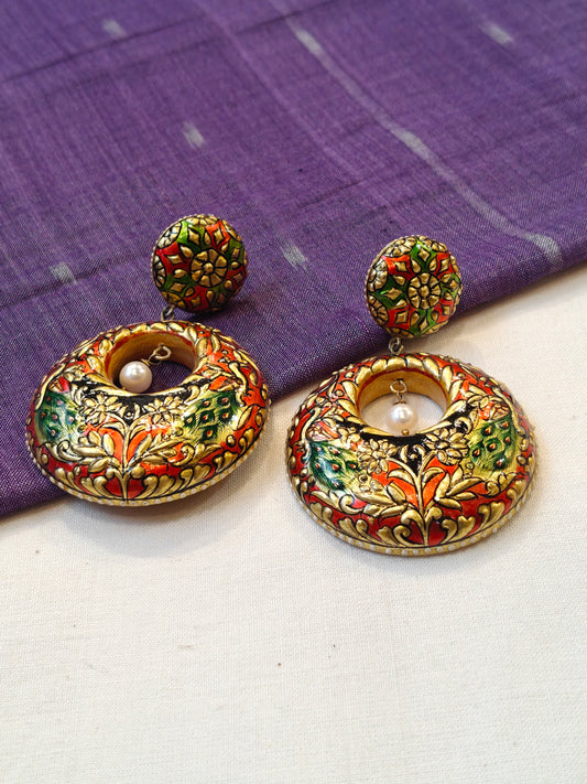 Red green good leaf embossed earrings with peacocks and a pearl drop