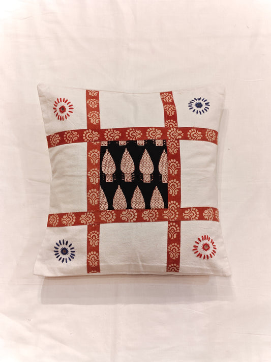 White and red patch work and embroidered cushion cover