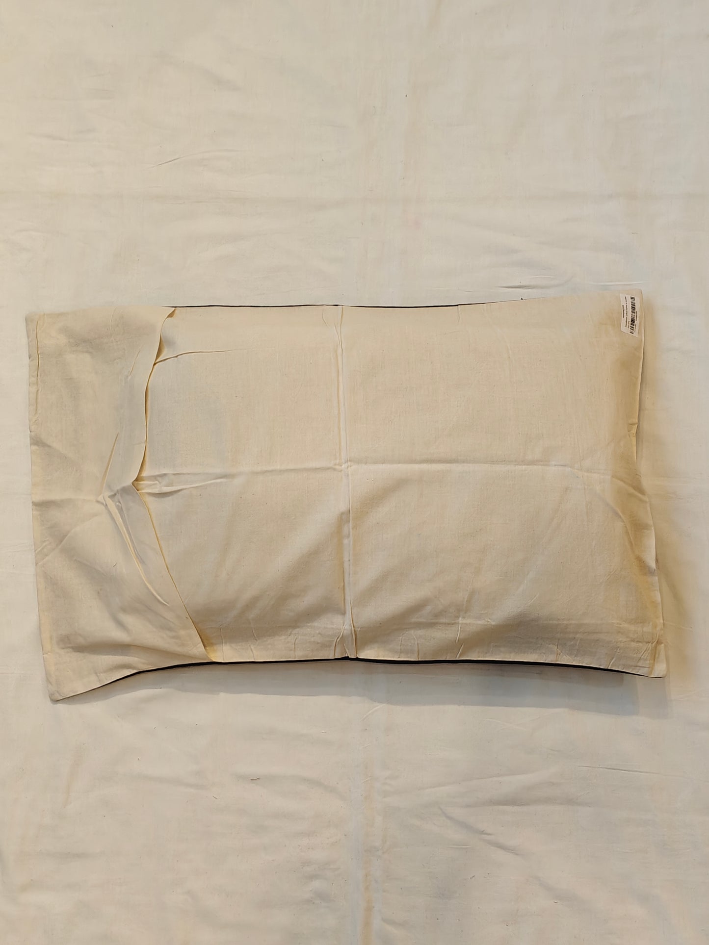Off-white handcrafted cotton pillow cover with borders