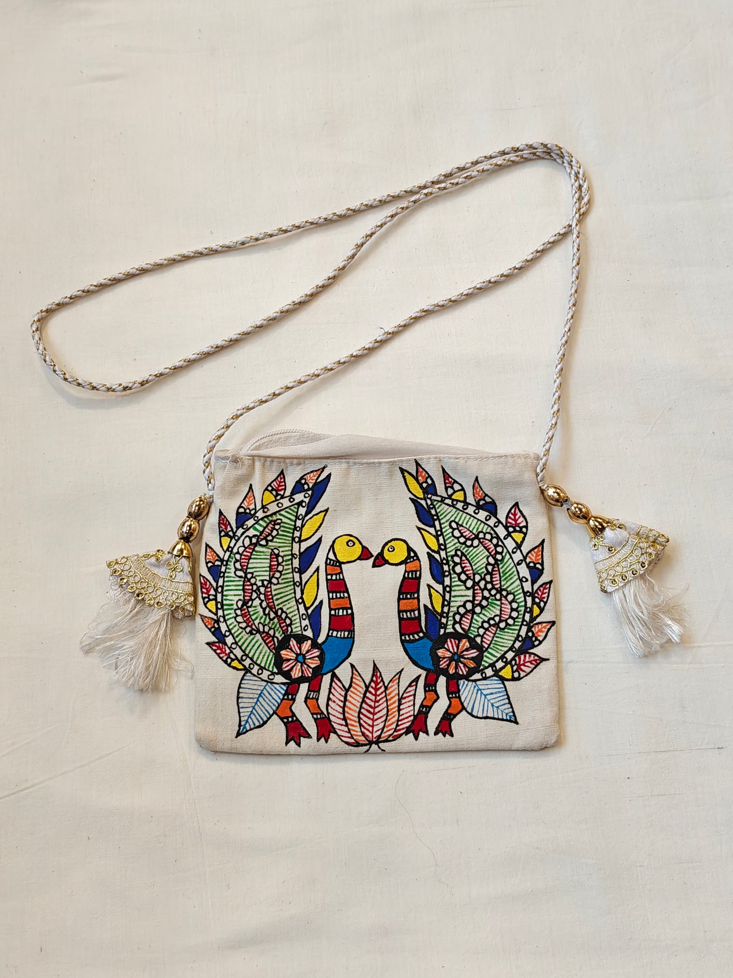Handpainted on off white base fabric pouch with zipper closure, Tassles and sling - multiple designs available