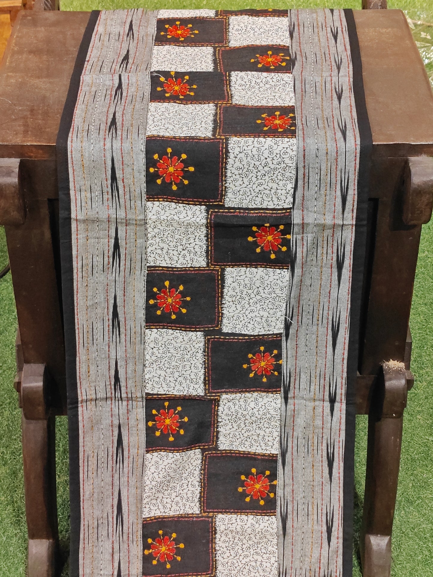 White, grey n black table runner - hand woven ikat with hand embroidered floral motifs