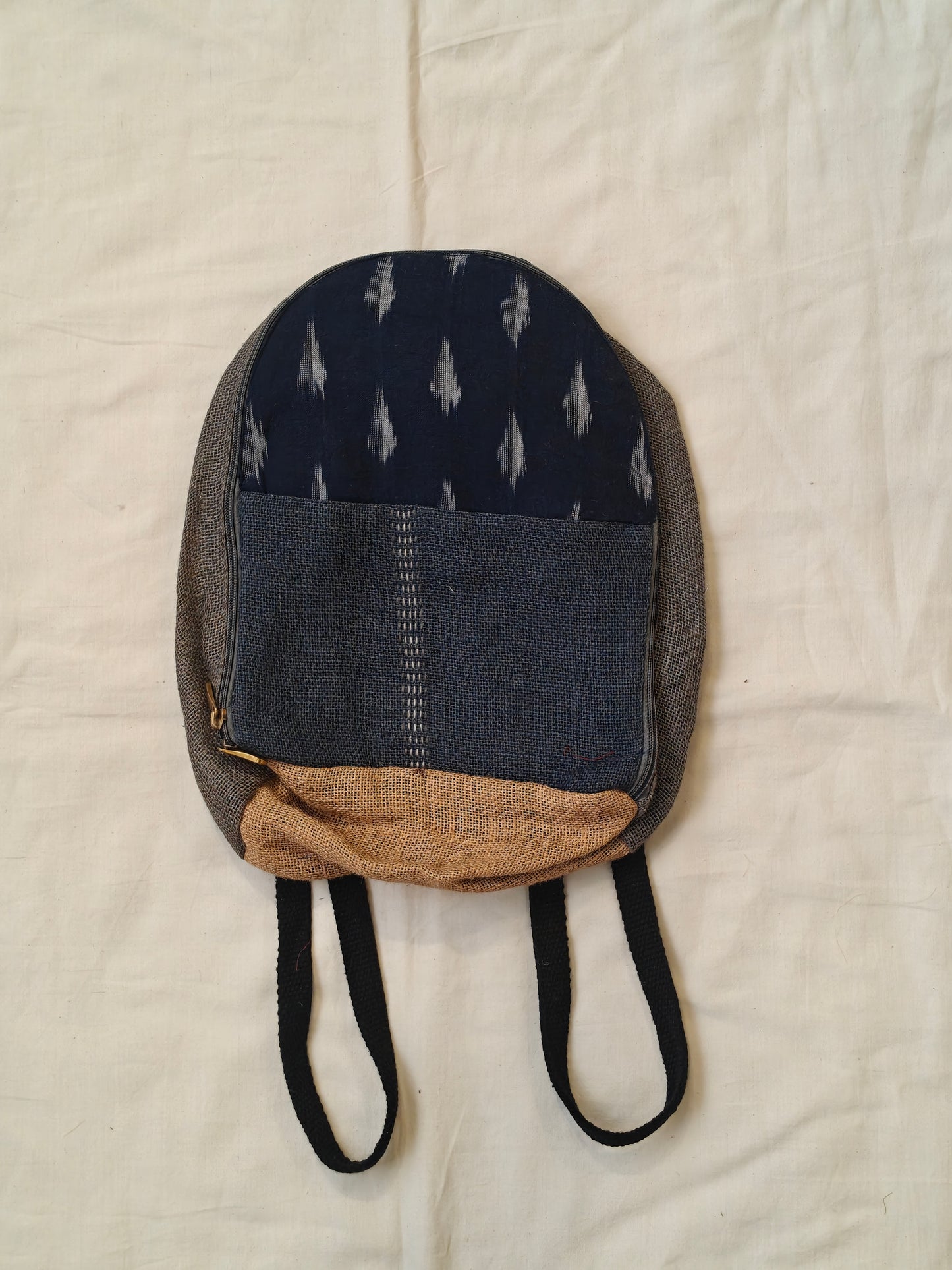 Day back pack cum handbag in jute with fabric panel