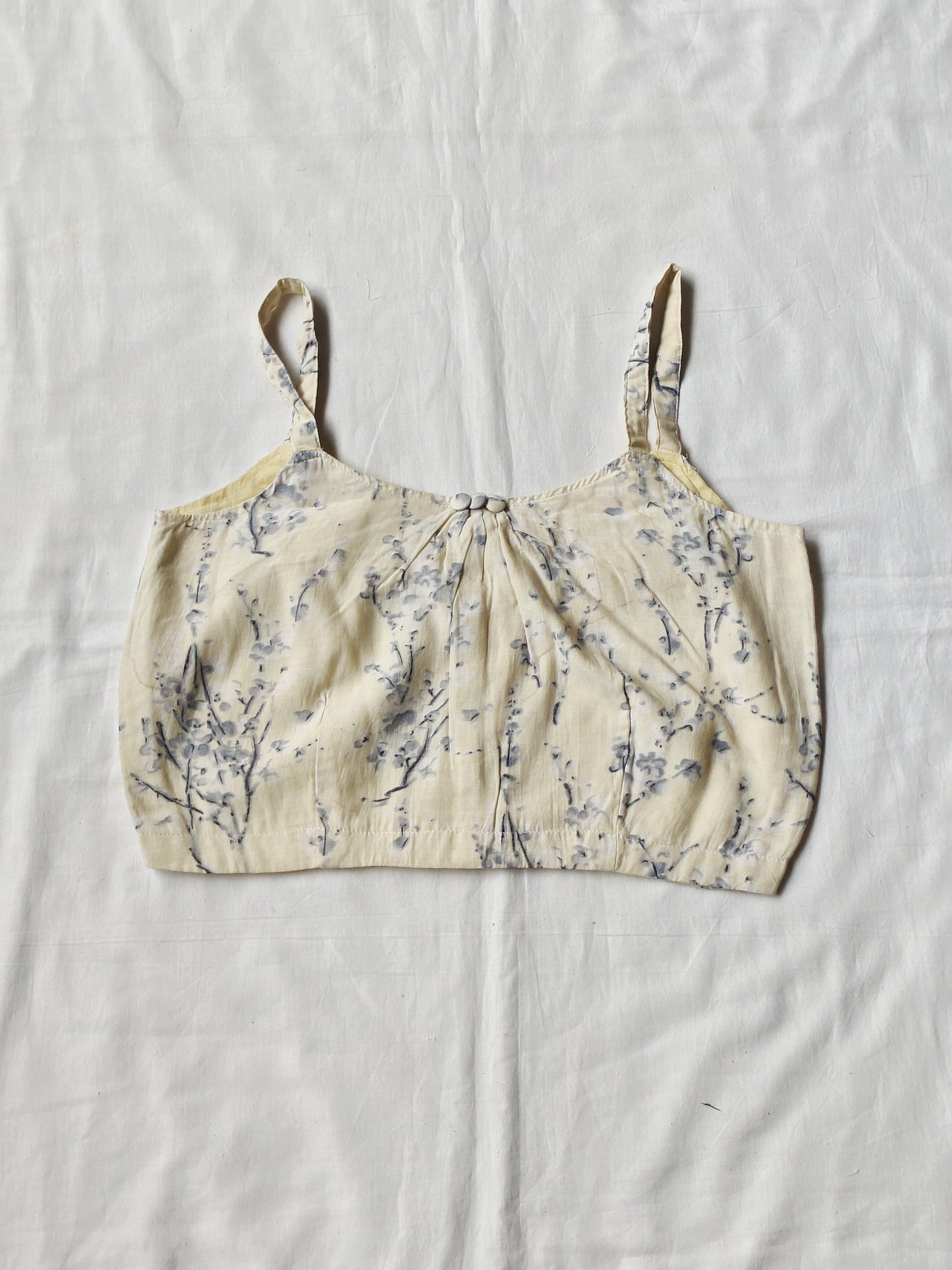 Pale yellow with grey leaves prints modal blouse