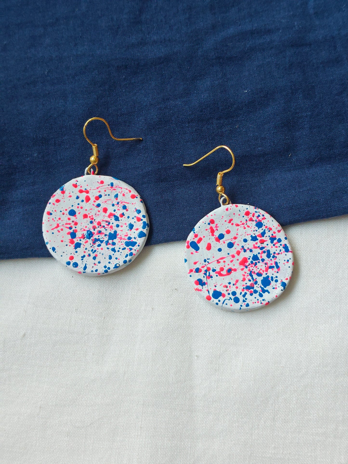 Round color splattered handcrafted, handpainted terracotta hook earrings