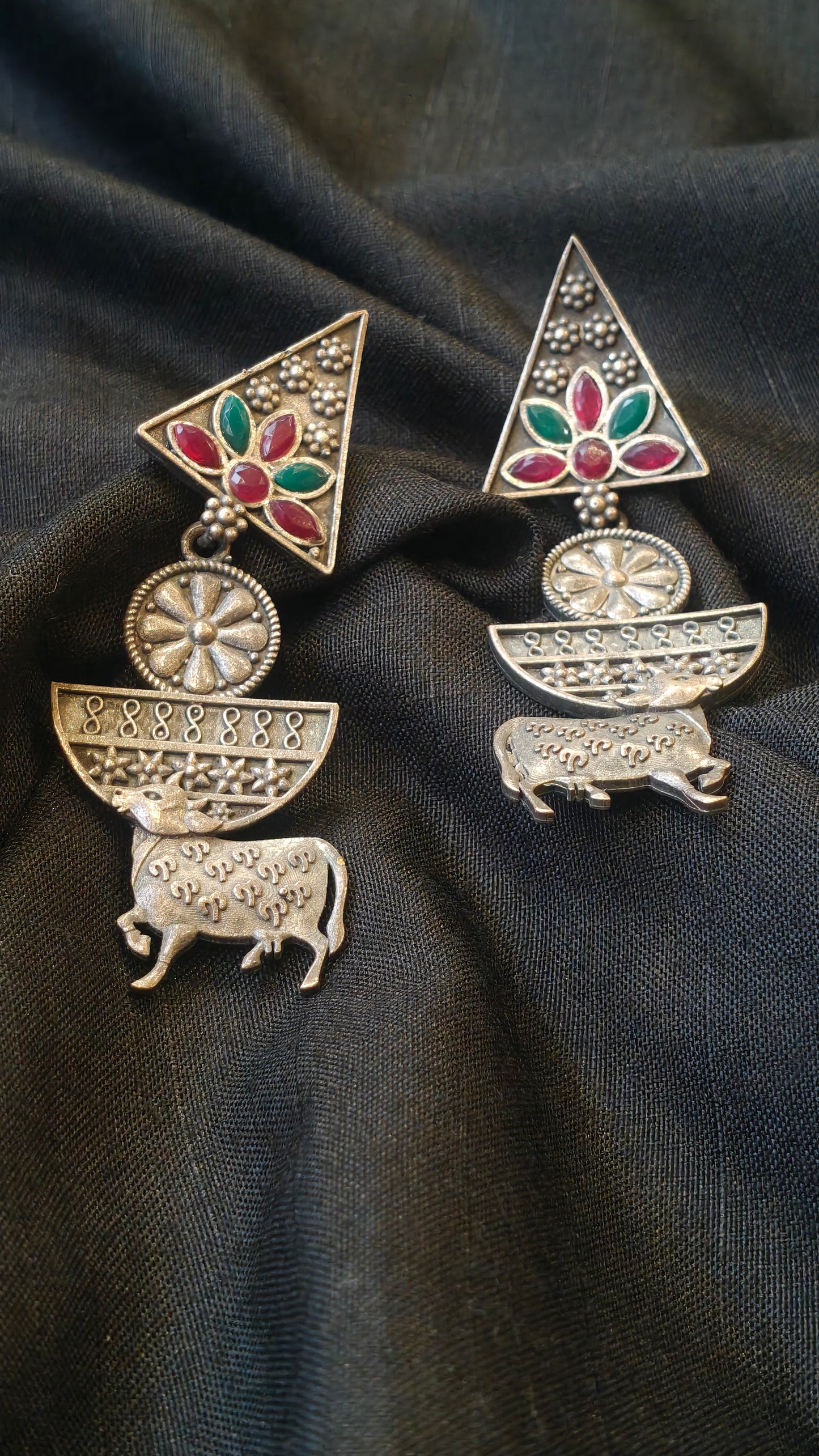 Triangular with green n red stones and cow design handcrafted oxidised stud earrings