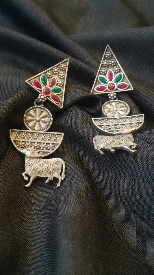 Triangular with green n red stones and cow design handcrafted oxidised stud earrings
