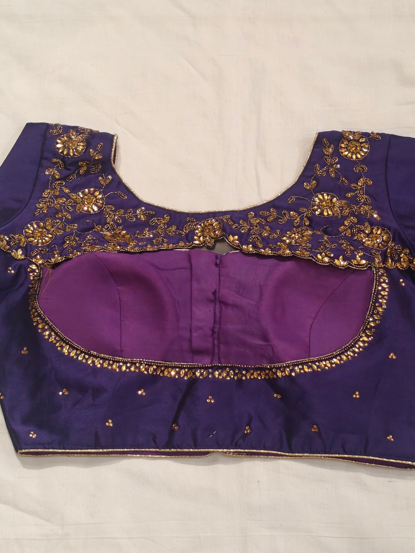 Art silk blouse with stone work and hand embroidery on back