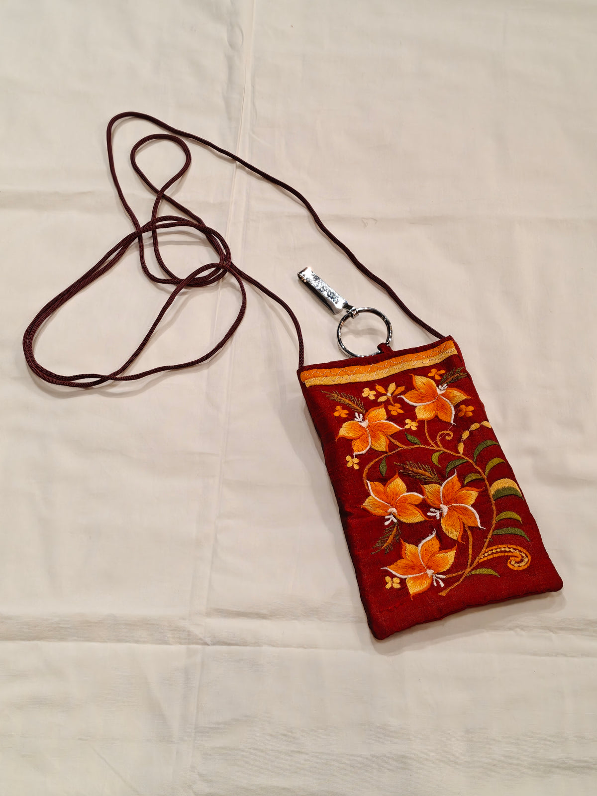 Silk embroidered phone pouches with waist clip on and a sling - multiple options available