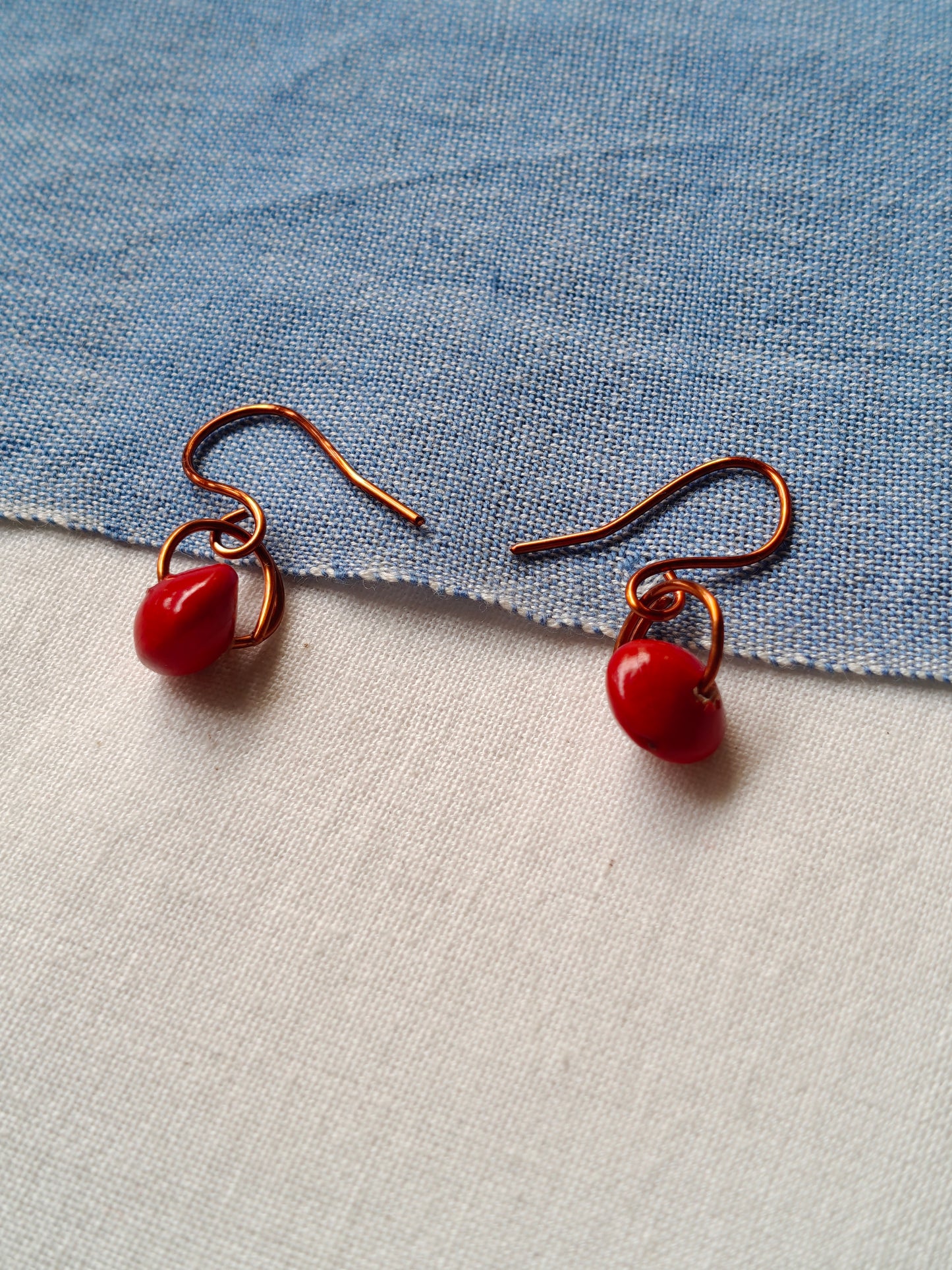 Handcrafted earrings designed with seed