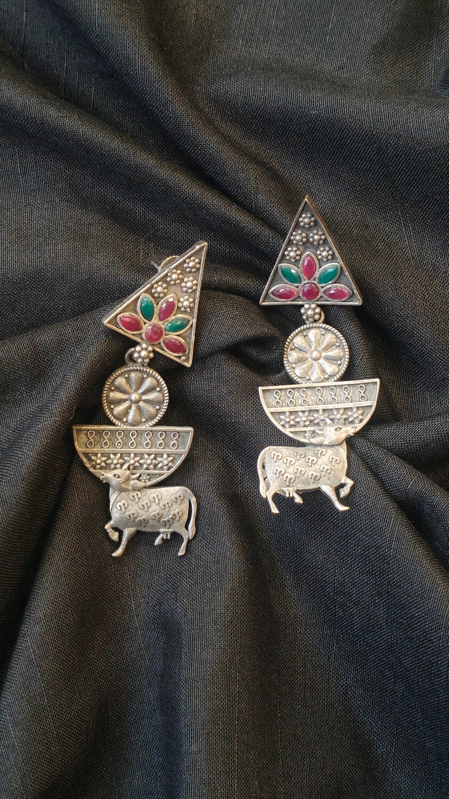 Triangular with green n red stones and cow design handcrafted oxidised stud earrings