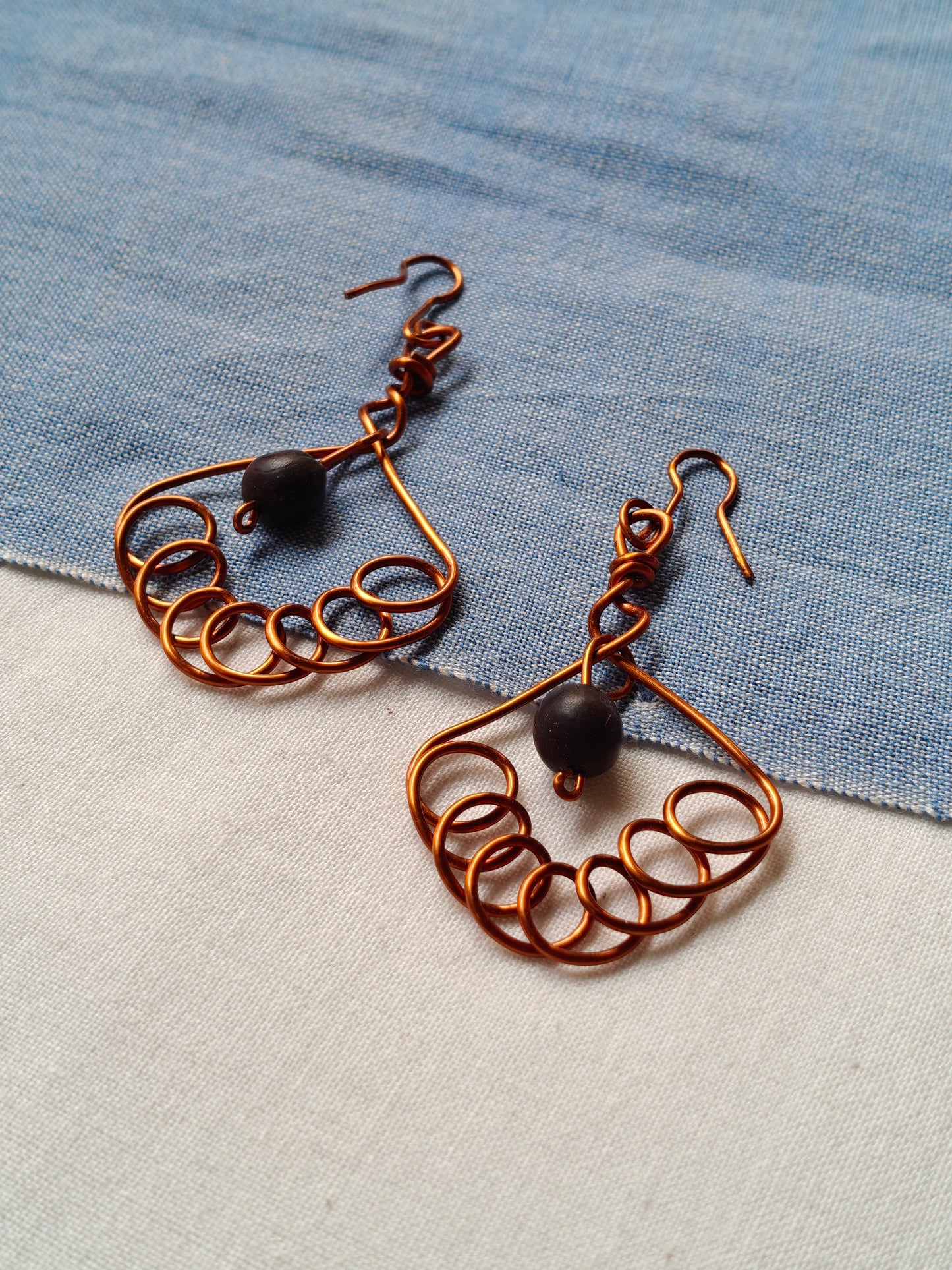 Handcrafted seed earrings with copper hooks