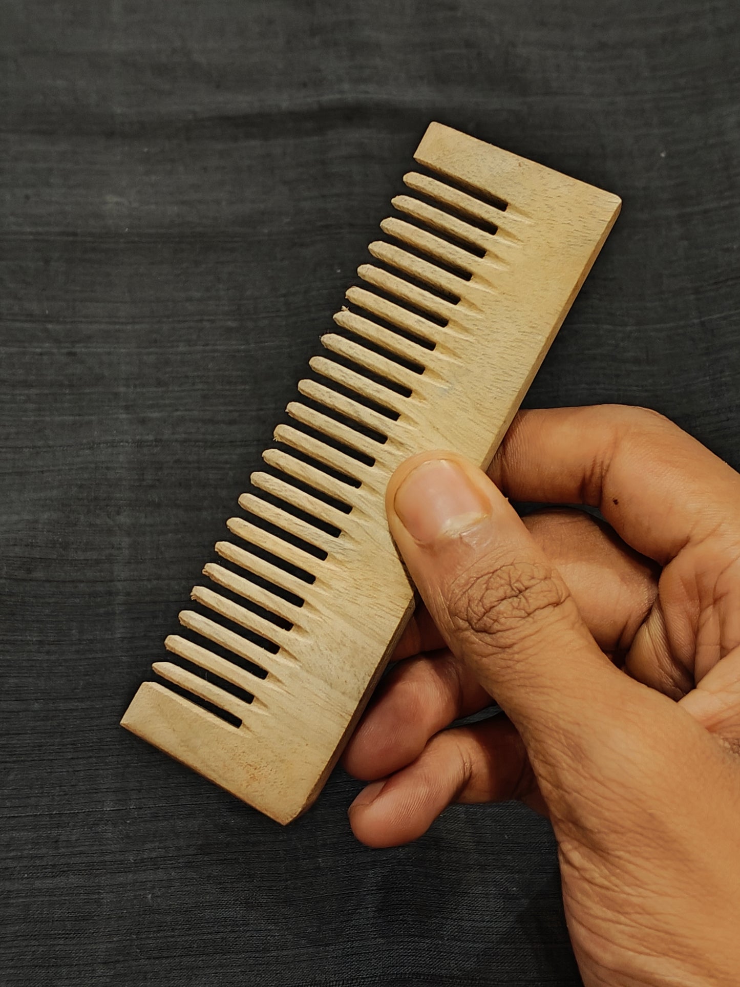 Handcrafted Neem Wood combs in different styles - click to see