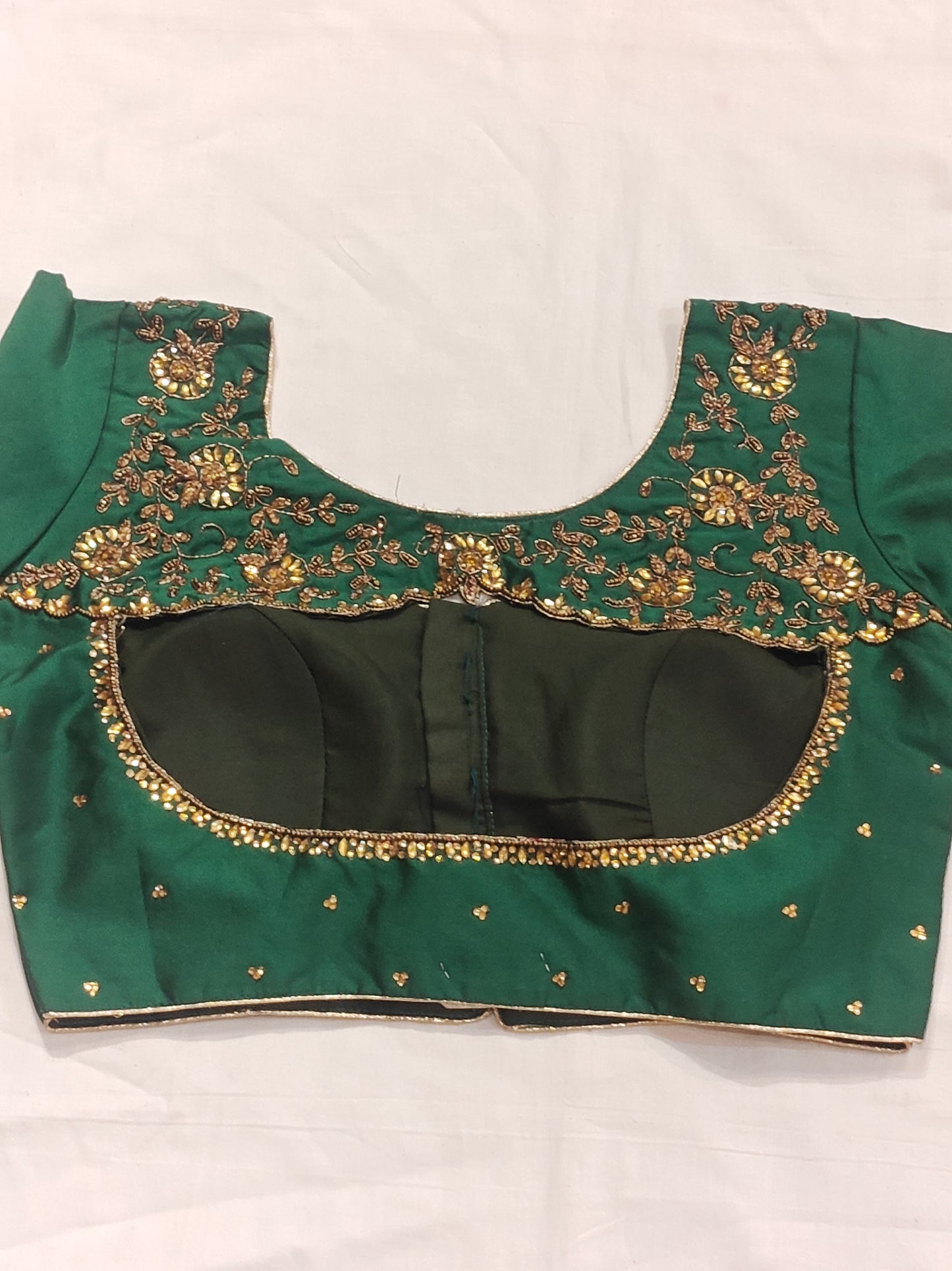 Art silk blouse with stone work and hand embroidery on back