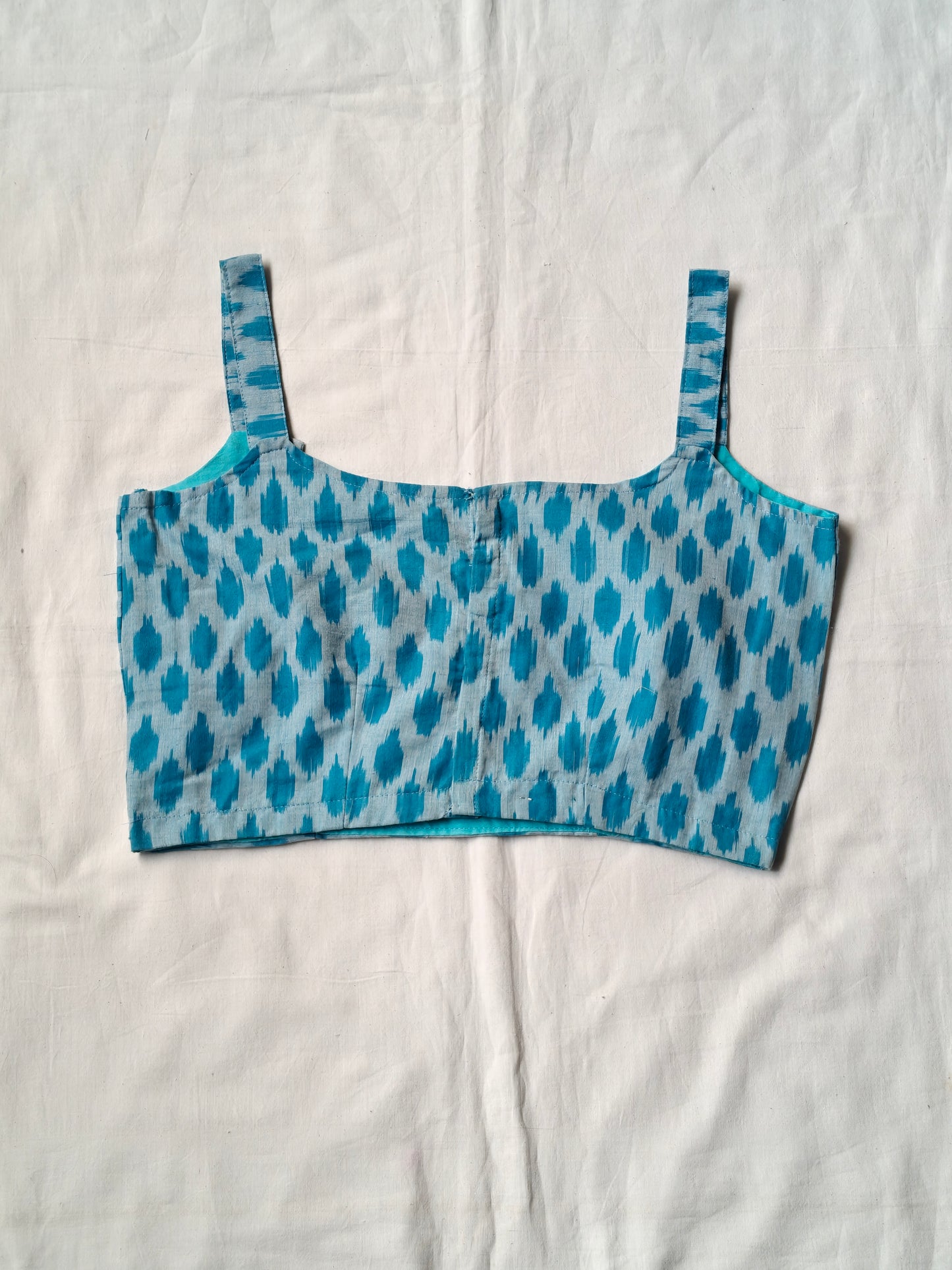 Blue mercerized cotton ikat sleeveless handloom blouse