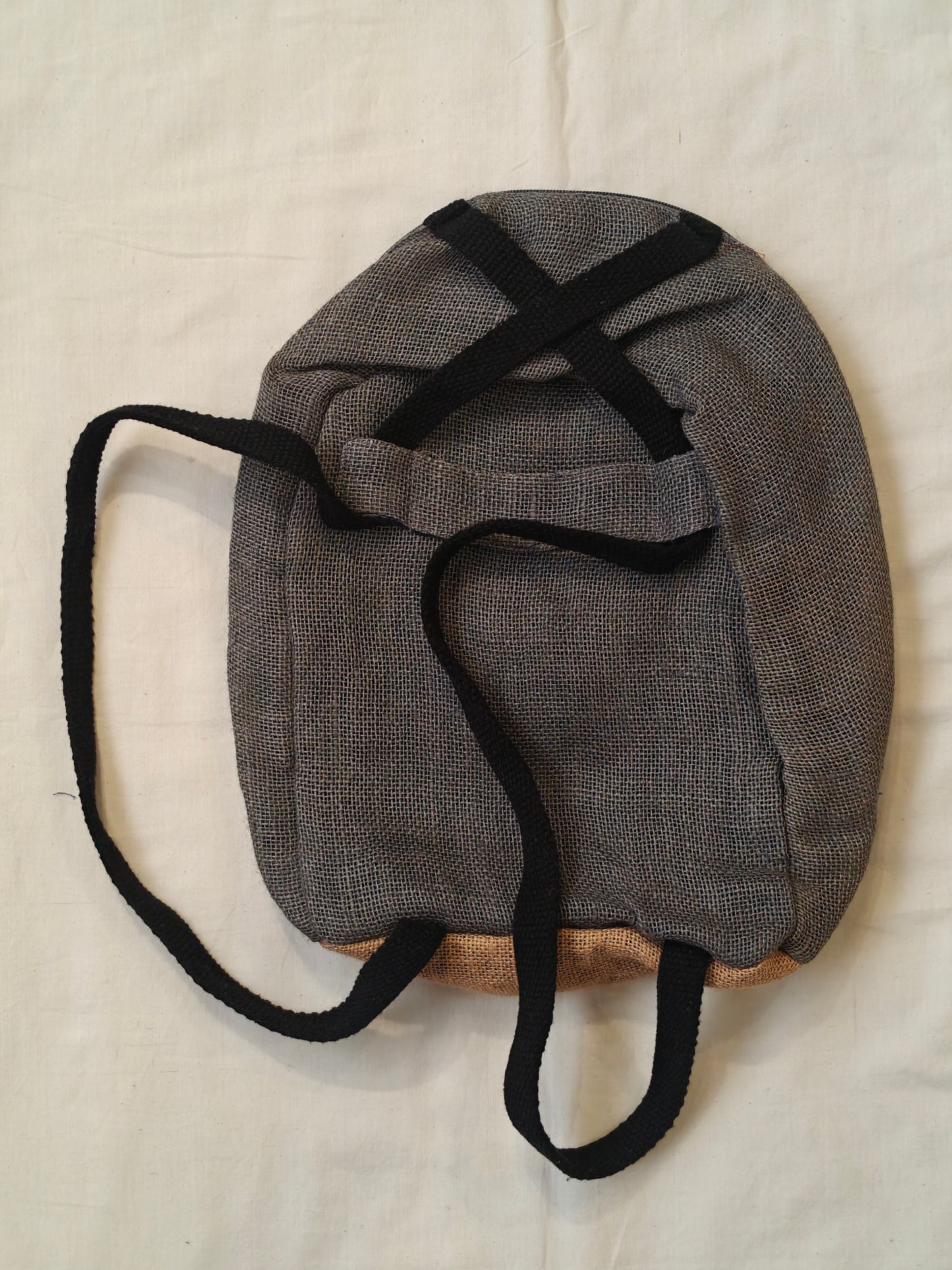 Day back pack cum handbag in jute with fabric panel