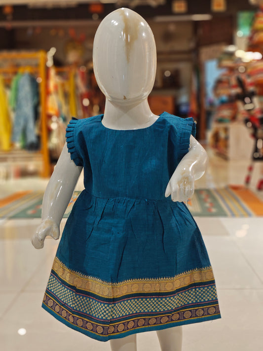 Blue ethnic cotton frock for girls with colorful border at hem