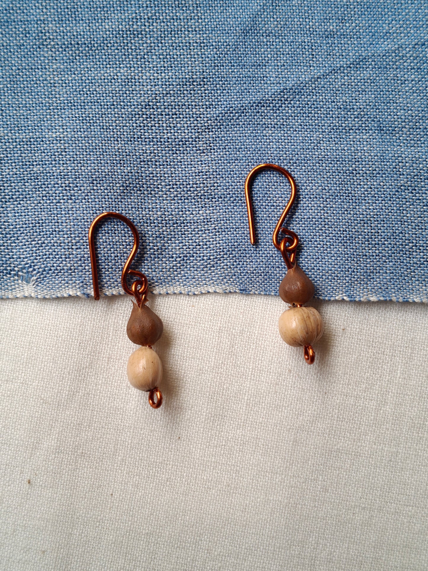 Handcrafted earrings designed with seed