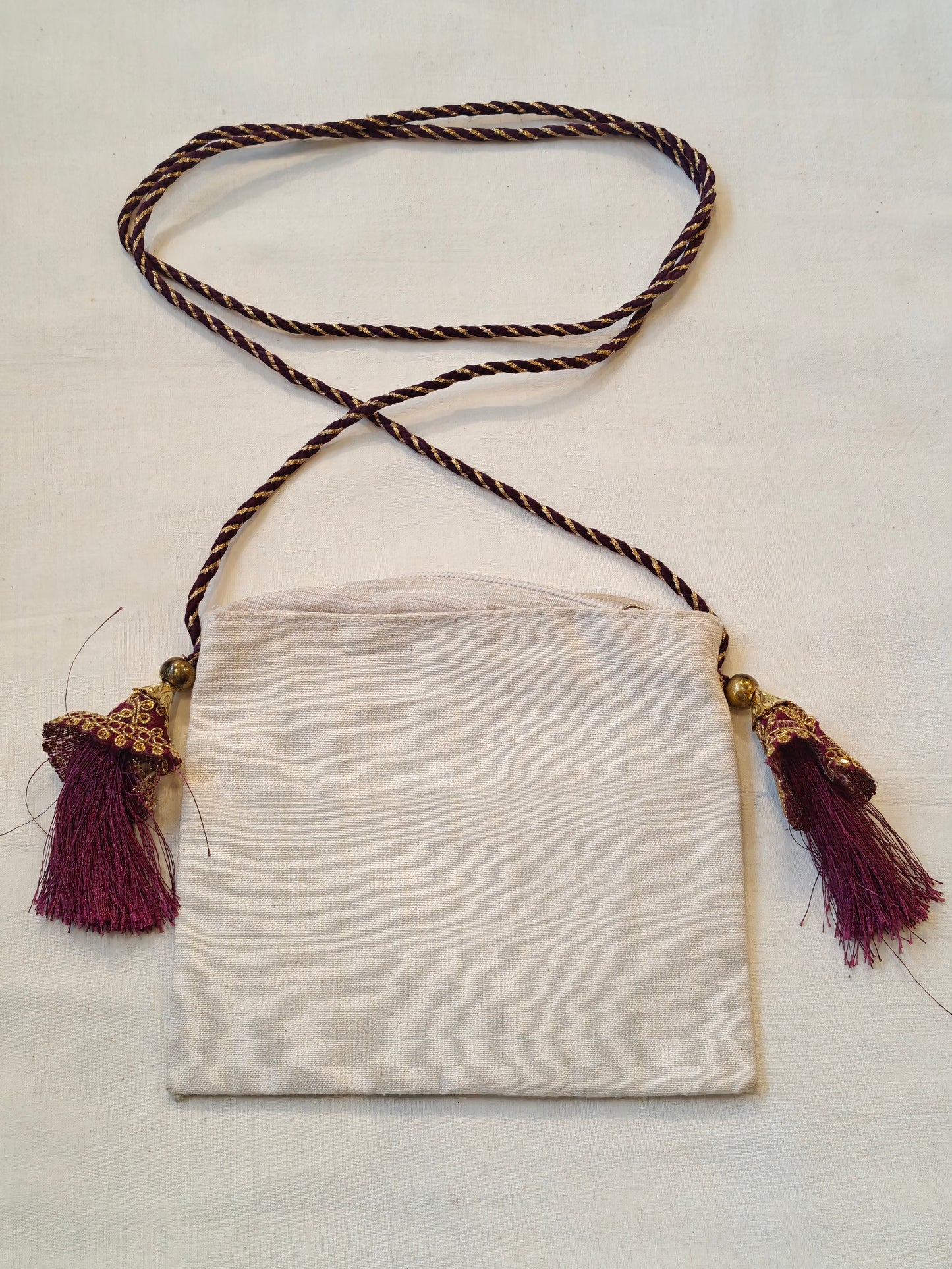 Handpainted on off white base fabric pouch with zipper closure, Tassles and sling - multiple designs available