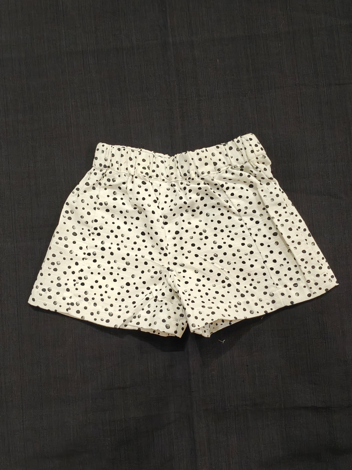 White shorts with black polka dots for children