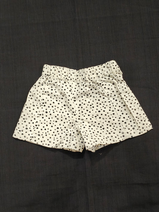 White shorts with black polka dots for children