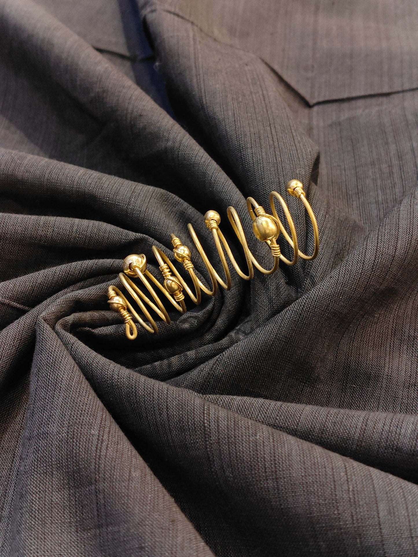 Long spiral finger ring with beads -  hand made in brass
