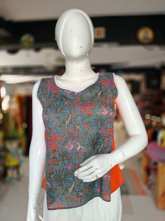 Green and orange flies and floral printed sleeveless top