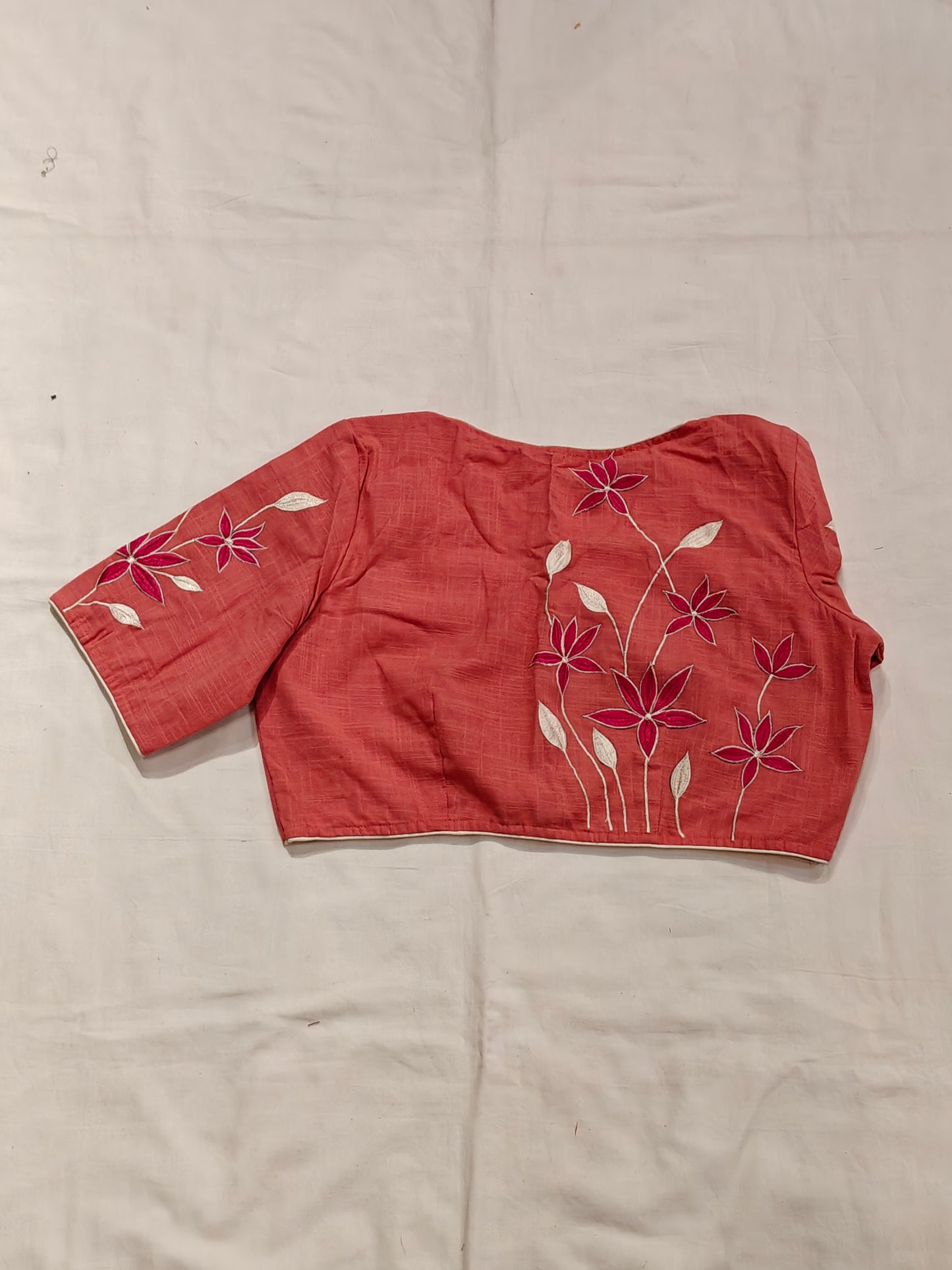 Peach floral embroidered back, elbow sleeved cotton blouse