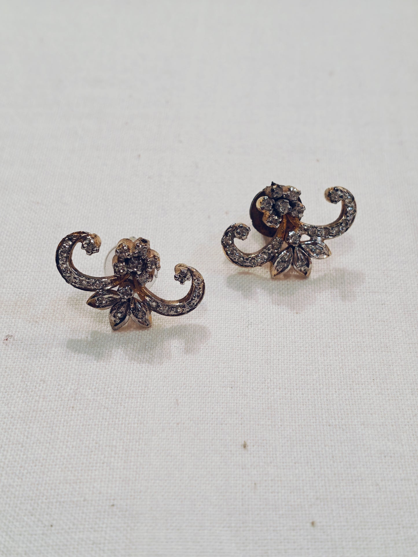 Floral design white stones studded earrings