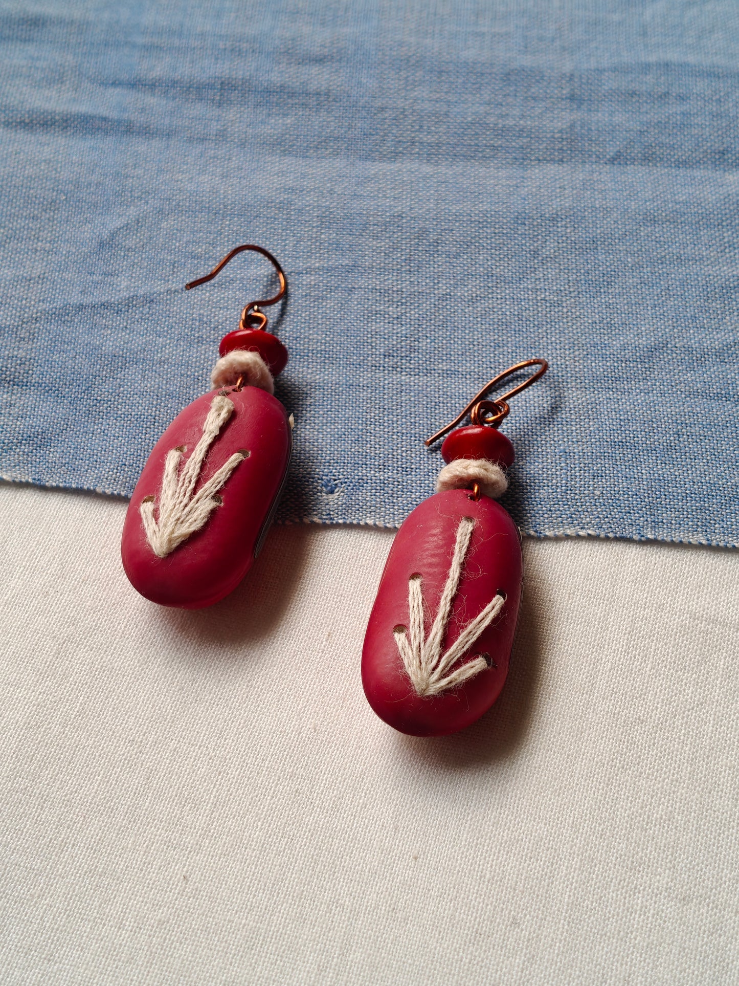 Handcrafted seed earrings with copper hooks