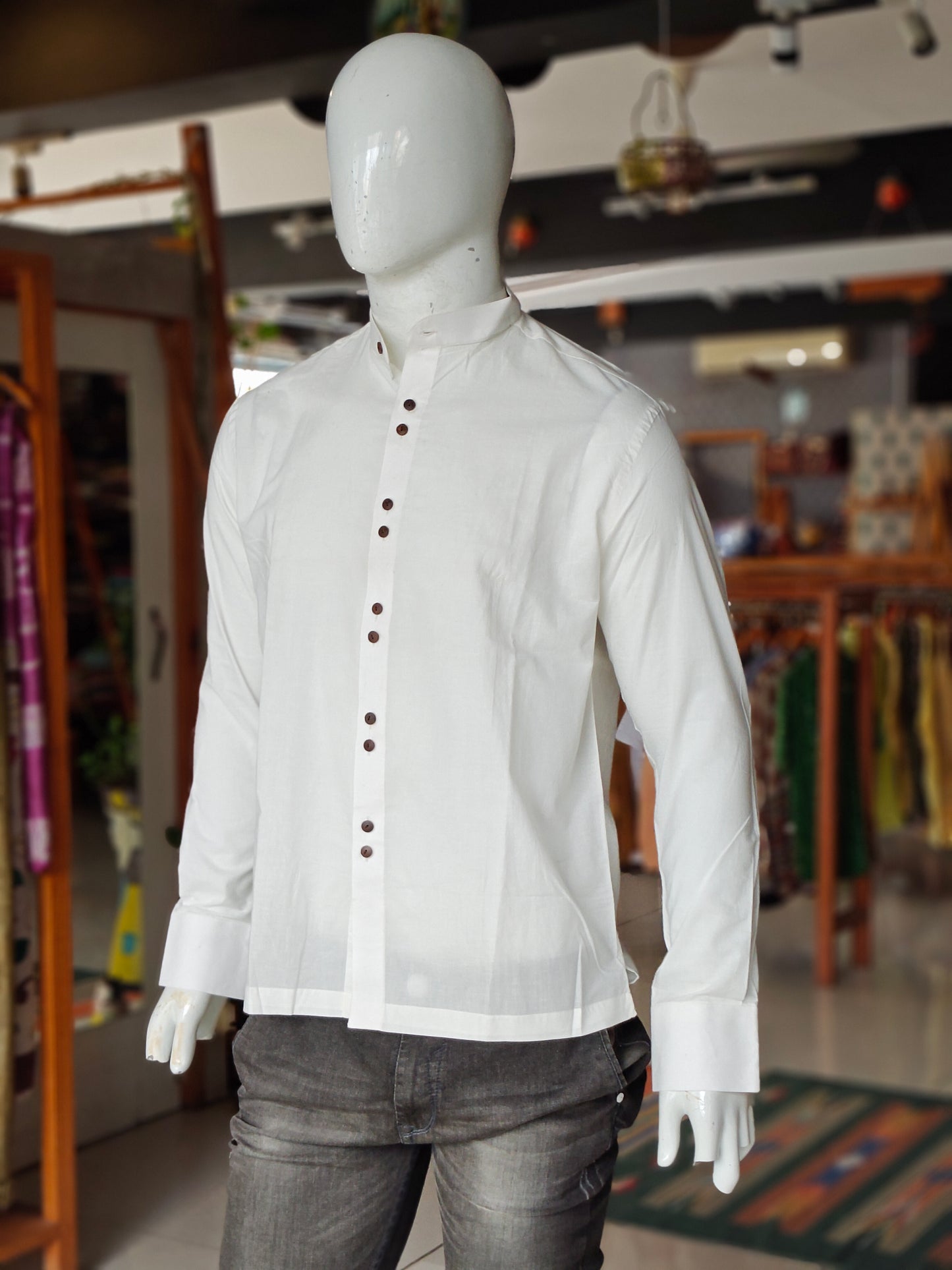Plain white men's shirt with wooden buttons