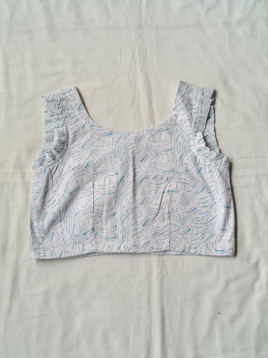 Blue hand block printed design on white cotton sleeveless blouse
