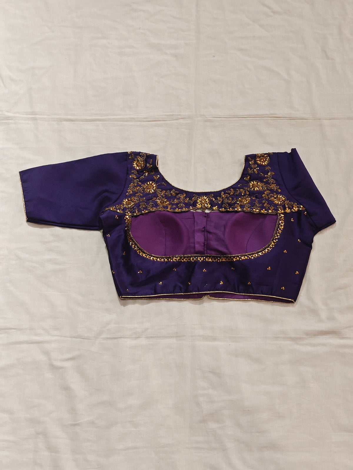 Fancy back blouse with embroidery and stone work on back