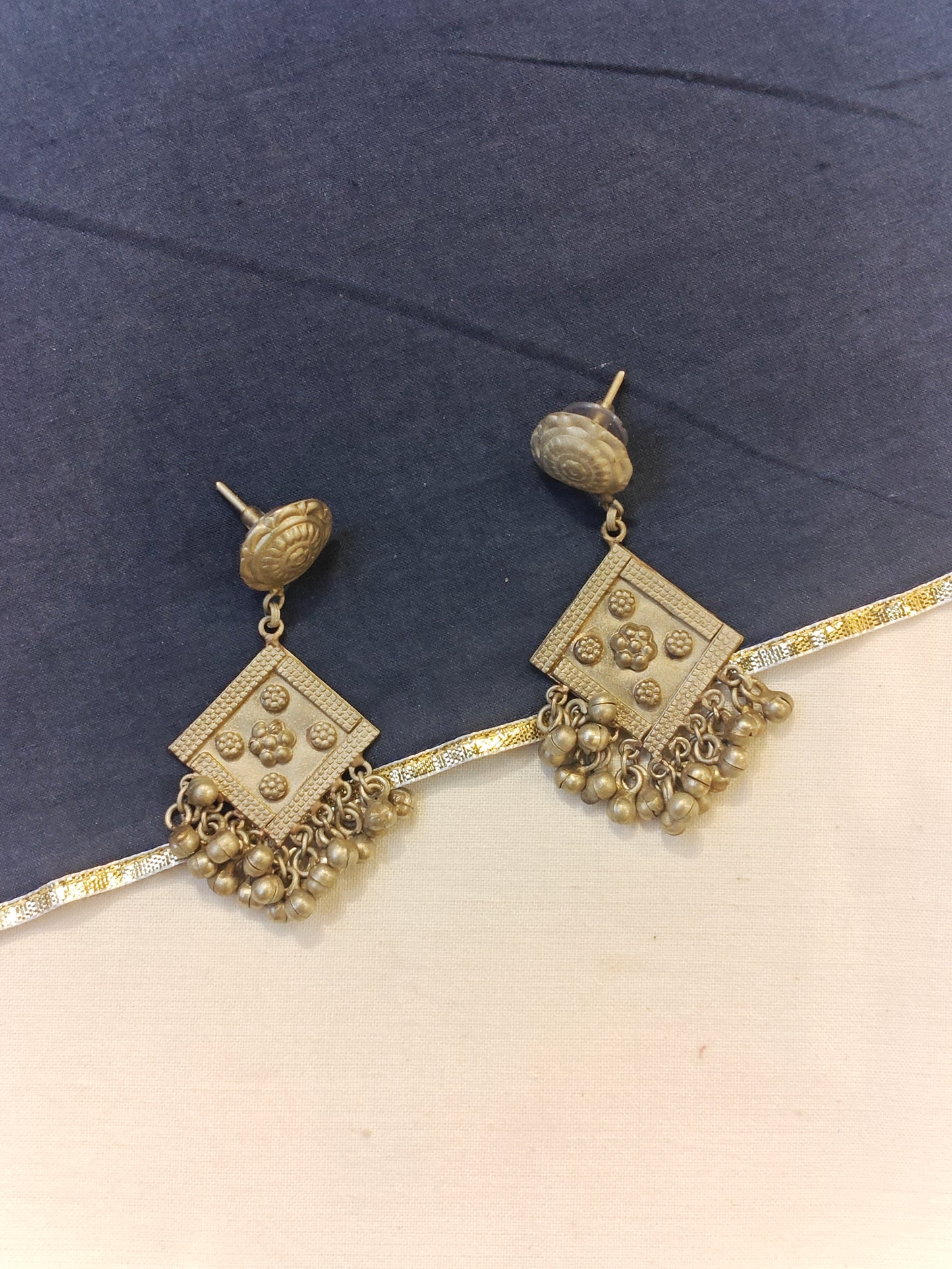 Diamond shaped stud earrings with flower patters and ghungros - handcrafted