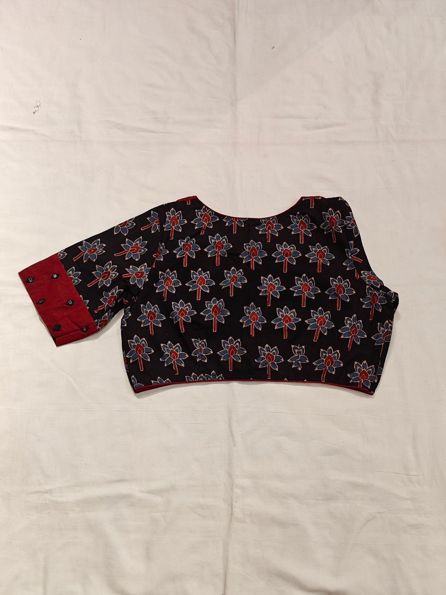 Black and maroon Ajrakh handblock printed elbow sleeved blouse with mirror embroidery