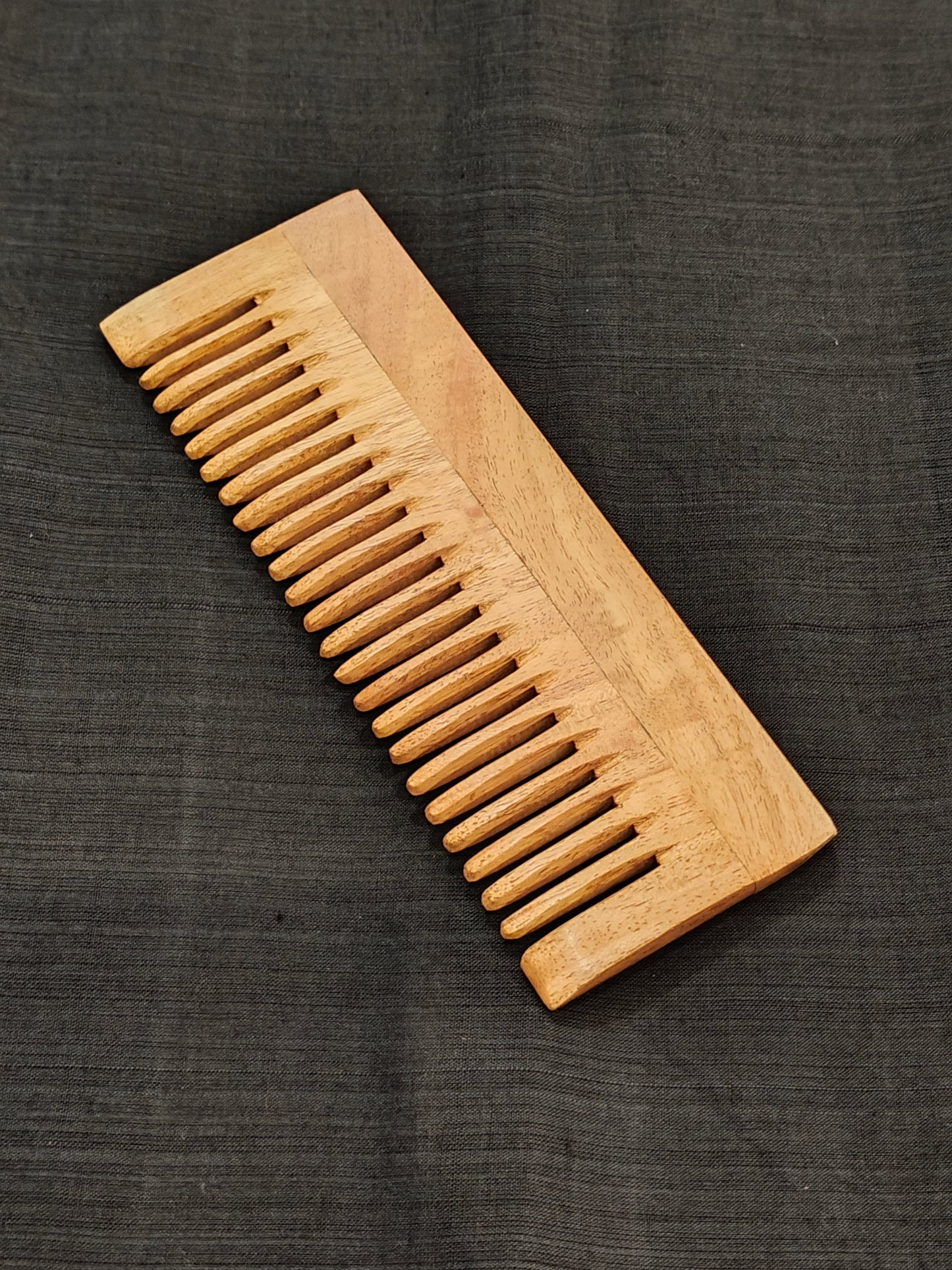 Handcrafted Neem Wood combs in different styles - click to see