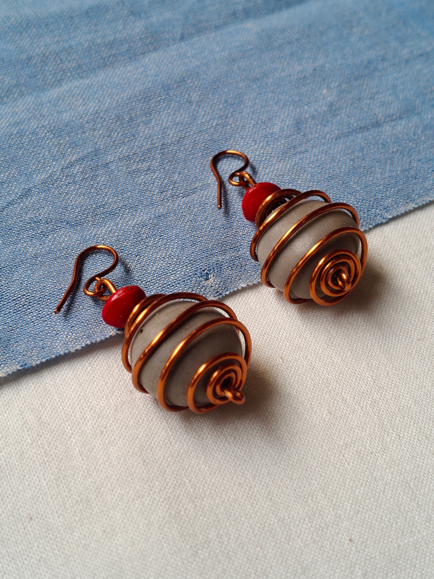 Handcrafted seed earrings with copper hooks
