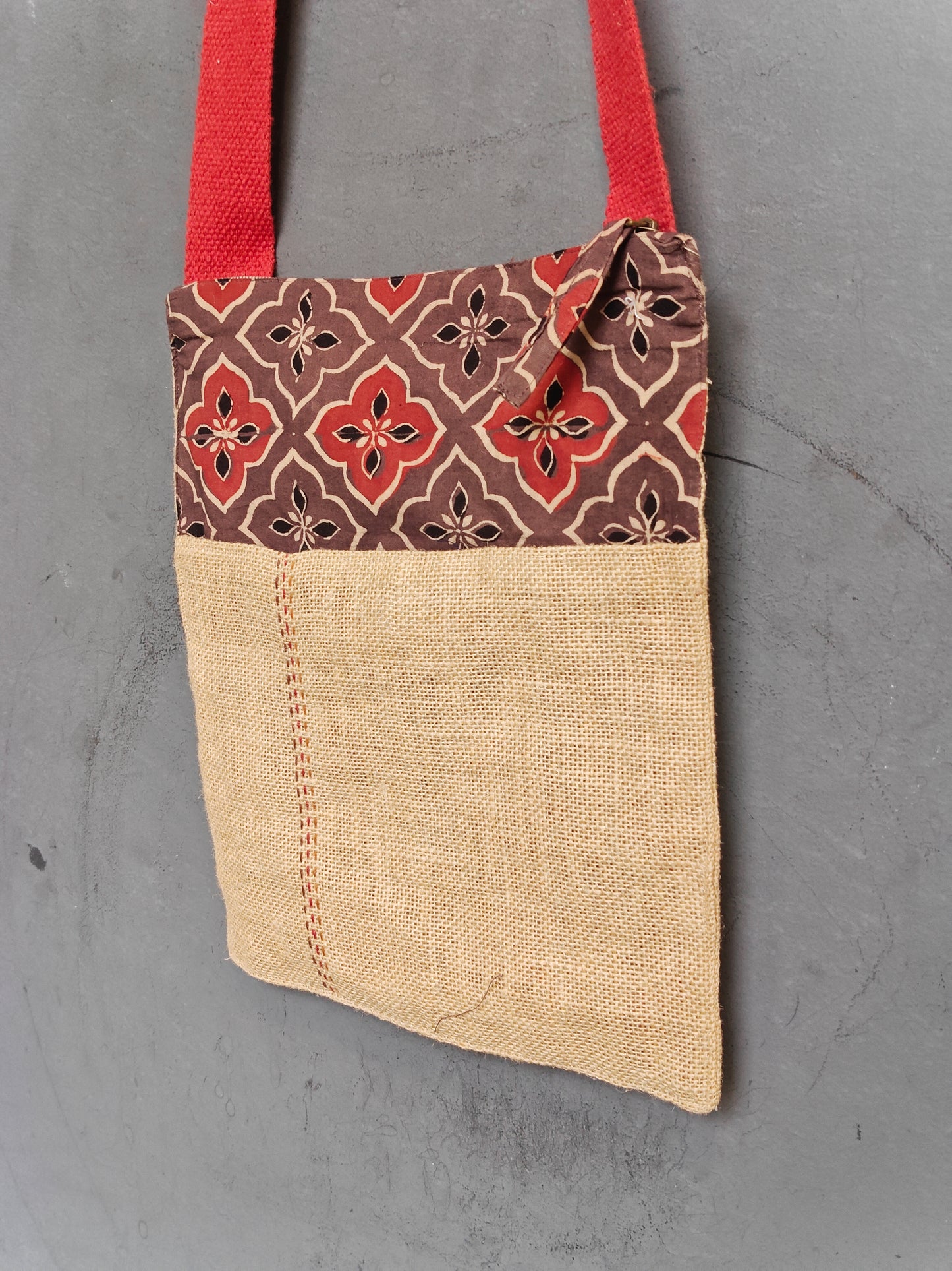 Handmade crossbody sling bag with multicolour fabric panels and jute