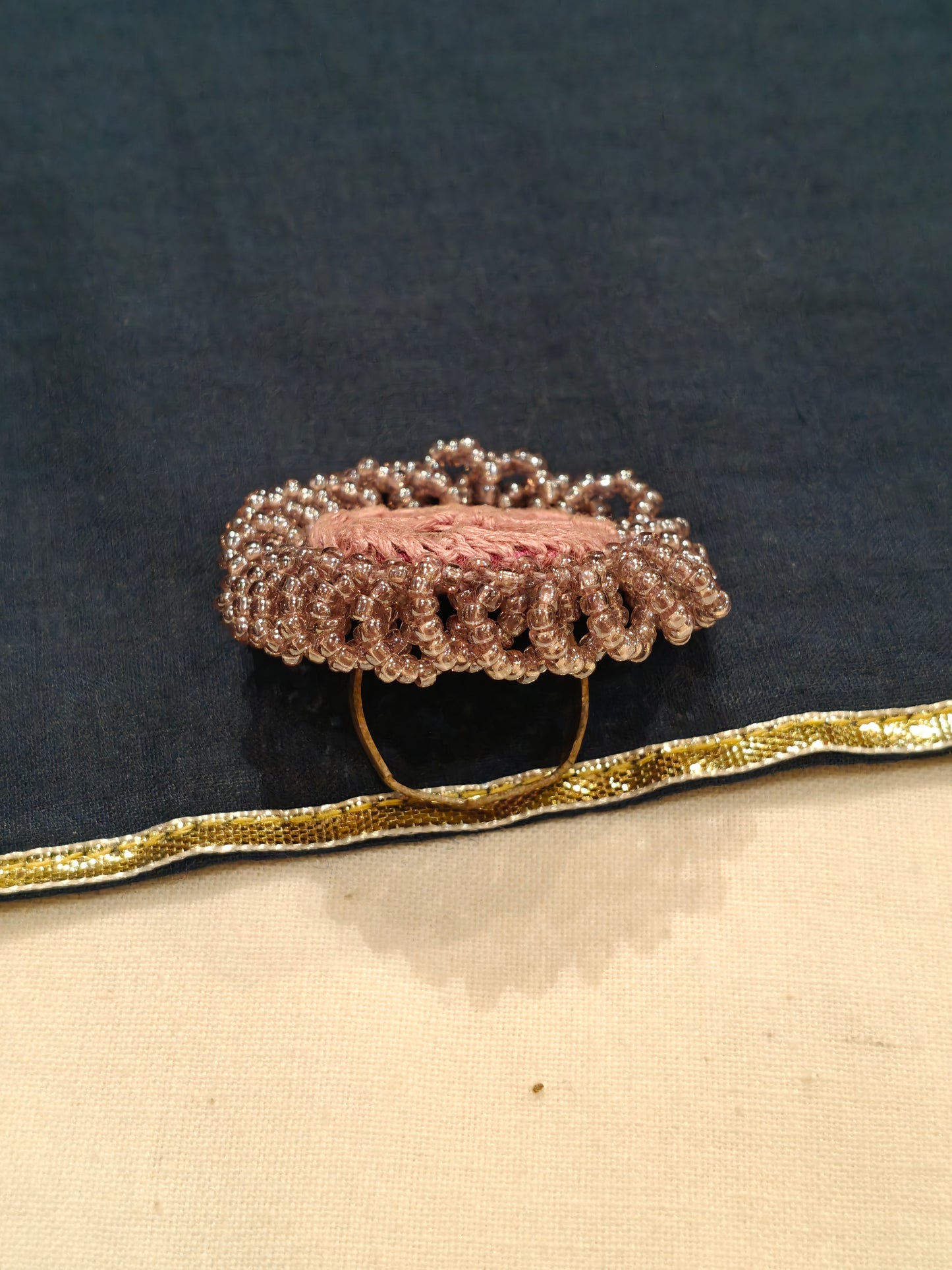 Handcrafted finger ring with bead work and mirror