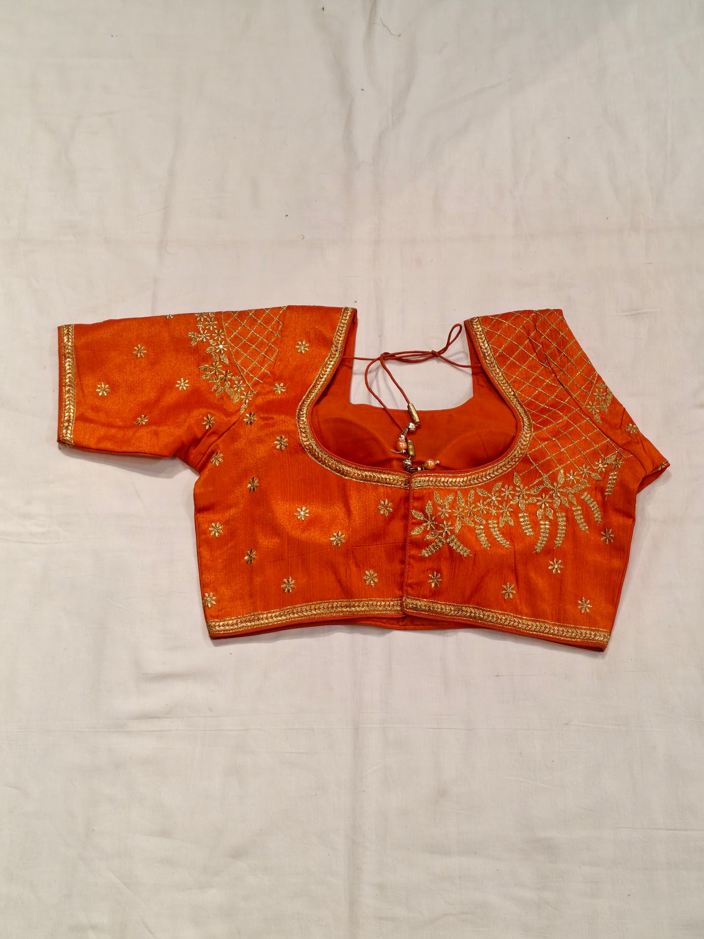 Silk short sleeves blouse with golden embroidery