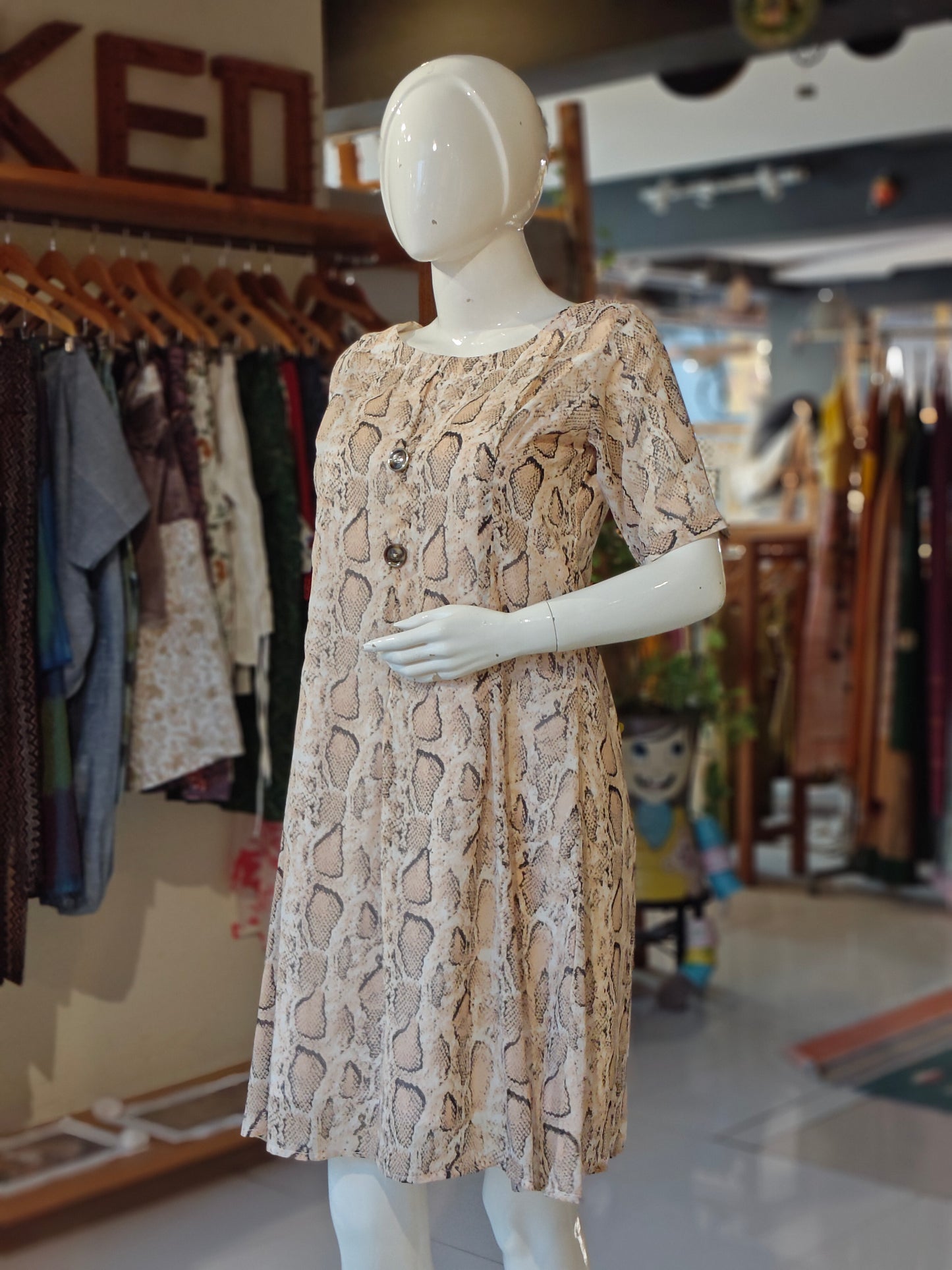 Beige black animal printed A line georgette dress