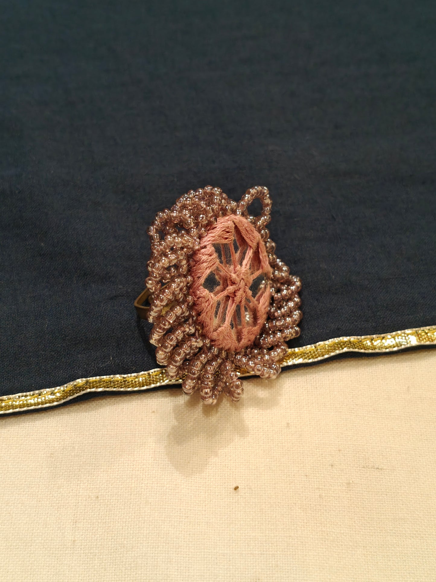 Handcrafted finger ring with bead work and mirror