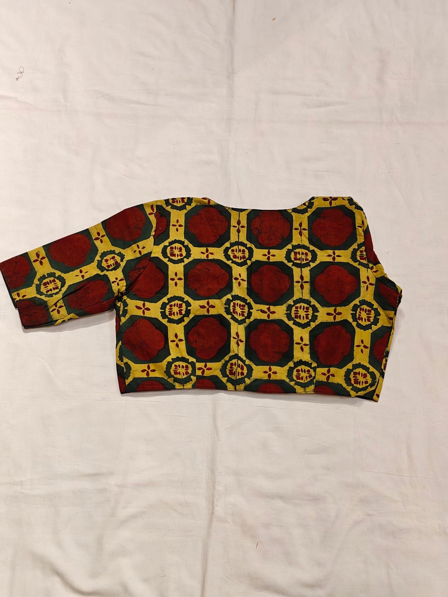 Yellow and red Ajrakh handblock printed elbow sleeved, v-neck cotton blouse