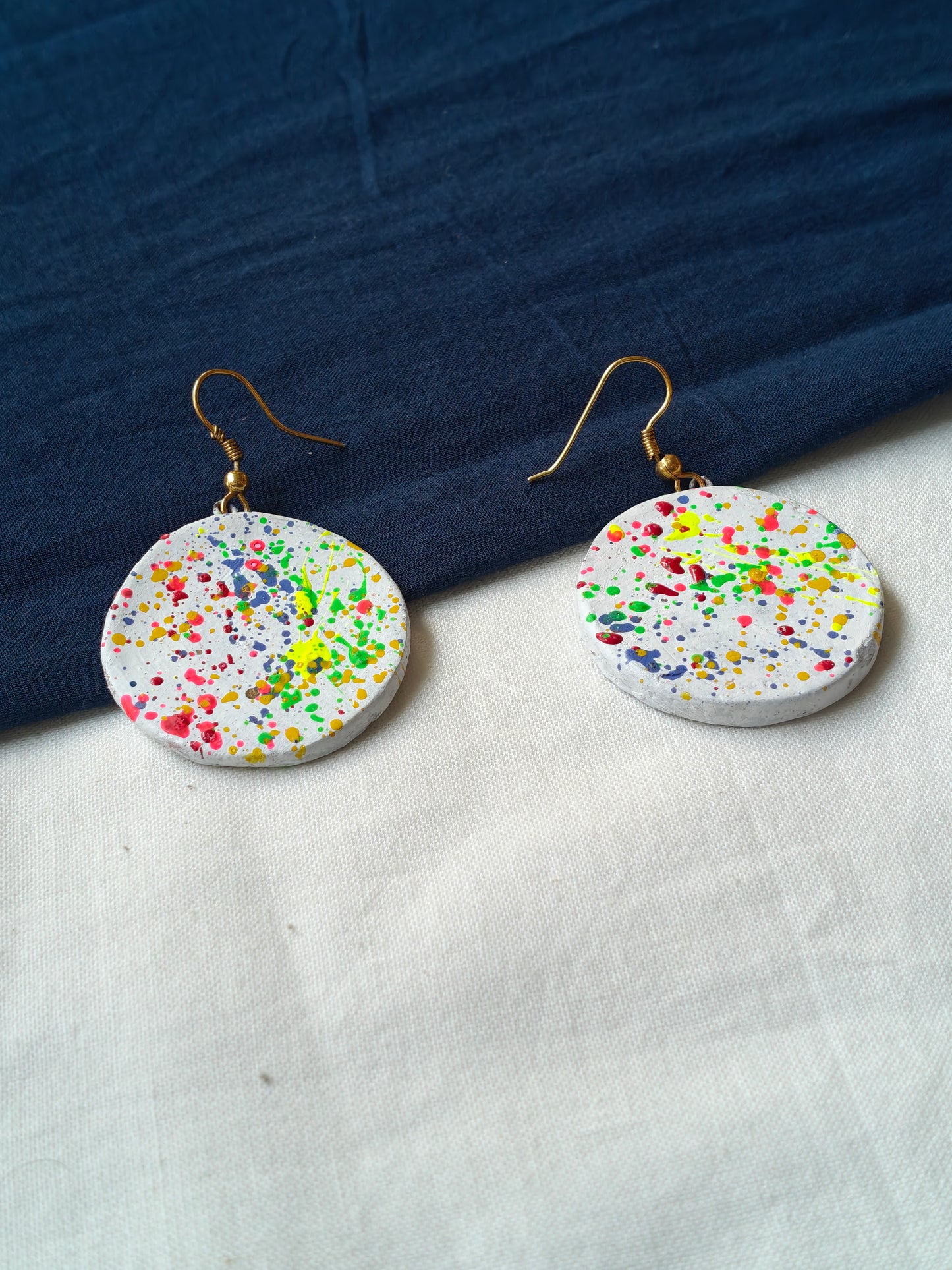 Round color splattered handcrafted, handpainted terracotta hook earrings