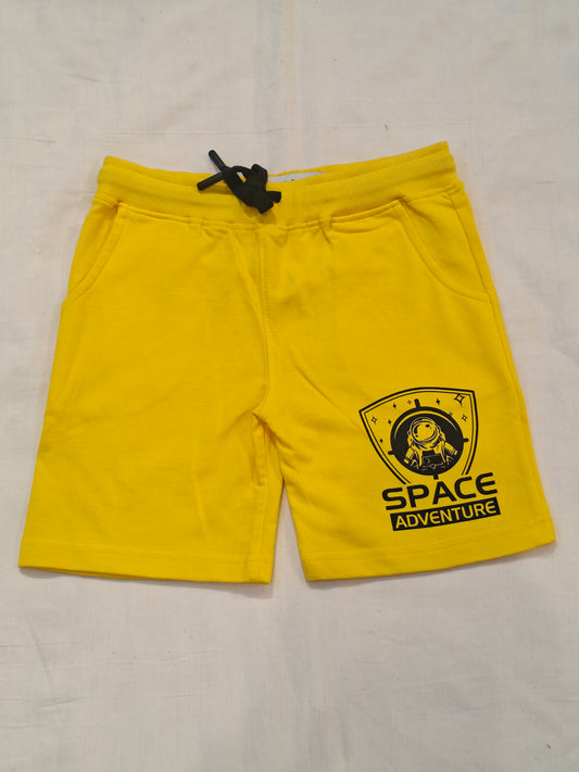 Yellow cotton knit shorts with Space adventure print